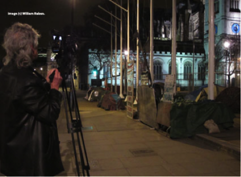 Film Still of The Houseless Shadow by William Raban showing scene in a London street by night